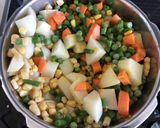 A picture of step 1 of Mixed Vegetable Subji.