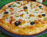 A picture of step 5 of Chicken Tikka Pizza 🍕🍕.