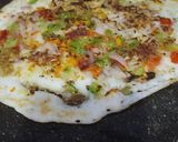 A picture of step 3 of #TR#Vegetable Uttappam with gunpowder spread side dish narial and onion chutney.