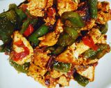 A picture of step 5 of Paneer capsicum dry sabzi.