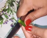A picture of step 1 of Chatpati Green Chillies.