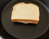 A picture of step 2 of Proper School Lunch Pepperoni Ham and Cheese Sandwich.