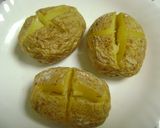 A picture of step 5 of Stuffed Baked Jacket Potatoes.