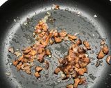 A picture of step 3 of Mushroom and Asparagus Risotto with Grilled Salmon.