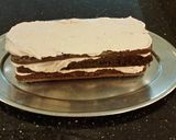 A picture of step 21 of Chocolate Layer Torte with Coconut Cream Filling and Frosting.