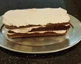 A picture of step 21 of Chocolate Layer Torte with Coconut Cream Filling and Frosting.