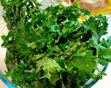 A picture of step 2 of Kale and kumquat salad.