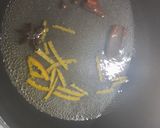 A picture of step 1 of Winter Spiced Orange Mocktail.