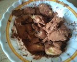 A picture of step 12 of Banana nut cake with chocolate frosting.