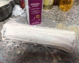 A picture of step 7 of Lotus biscoff strawberry Swiss roll cake.