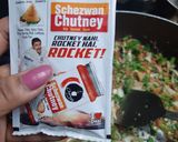 A picture of step 4 of Schezwan fried rice sizzler.