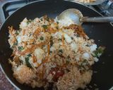 A picture of step 2 of Singapore chicken noodles rice.