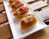 Foto del paso 6 de la receta: Patatas rellenas de boloñesa gratinadas