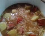 A picture of step 9 of Sauerkraut and polish kielbasa.