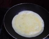 Foto langkah ke 2 dari resep Nasi Kuning Lipat Telur Dadar.