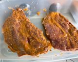 Une image de l'étape 6 de Côtes de porc grillées marinées sauce tomate aux pommes de terre et piments verts.