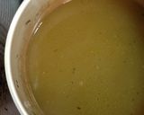 A picture of step 4 of Chicken stock with leftover chicken bones.