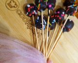 A picture of step 6 of 1 bite chocolatey marshmallow pops.
