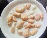 A picture of step 5 of PUNJABI THALI (Shahi paneer,laccha paratha with Dahi Bhalla).