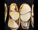 Une image de l'étape 6 de Aubergines farcies saucisses Strasbourg champignons poivrons épices cajun et scamorza grillée.
