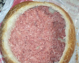 Foto del paso 3 de la receta: Pan de hogaza relleno de mozzarella, carne picada y jamón