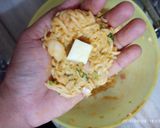 A picture of step 2 of Cheesy Maggie Bonda.