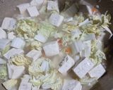Foto langkah ke 4 dari resep Sup Tahu Rebus Jamur Enoki.