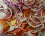 A picture of step 1 of Roast potatoes, carrots served with cabbage and kachumbari.