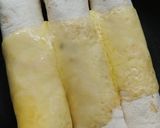 A picture of step 7 of Mexican chicken enchiladas.