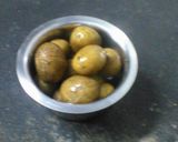 A picture of step 1 of Kashmiri Dum Potato.