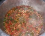 A picture of step 2 of Tomato egg soup  with  buttery patatos  swirls.
