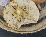A picture of step 18 of Chur Chur Naan Thali Chole Imli pyaaz chutney laccha pyaaz Chur chur Naan (Punjabi Dinner Thali).