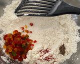 A picture of step 5 of Badam ne Chokhana lotna phiniya ladoo(Almond and rice flour whipped ladoo).