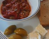 A picture of step 6 of Μπάμιες/Bamies--Greek style braised okra with tomatoes.