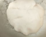 A picture of step 4 of Pathiri (Rice flour Roti) with chana.