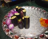 A picture of step 1 of Potato brinjal and onion stuff.