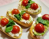 A picture of step 5 of Toasts with Cottage Cheese, Cherry Tomatoes, Guacamole, and More.