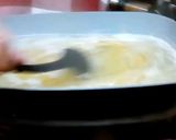 A picture of step 14 of Chicken Parmesan With Spaghetti and Garlic Bread.