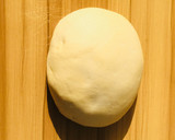 A picture of step 2 of Doughnuts.