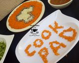 A picture of step 5 of White and orange rice (cookpad logo).