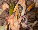 Foto del paso 3 de la receta: Calamares Rellenos de Carne, colas de Langostinos cocidos y Mejillones