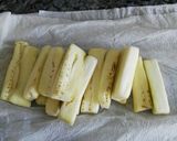 Foto del paso 4 de la receta Bastones de berenjena con miel de azahar