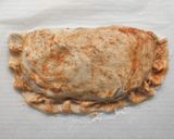 Foto del passaggio 6 della ricetta Calzone ripieno di coste indiavolate