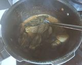A picture of step 1 of Chicken achari.