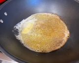 A picture of step 1 of Shrimp Scampi.