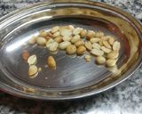 A picture of step 8 of Spnich rabdi with peanuts & Chocolate balls.