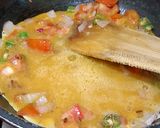 A picture of step 4 of Masala Scrambled Eggs.