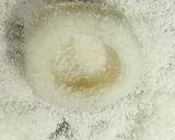 A picture of step 3 of Beetroot Coconut open Bhapa Pitha.
