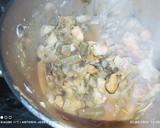 Foto del paso 6 de la receta: Alcachofas, rellenas de langostinos y mejillones
