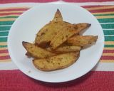 Foto del paso 4 de la receta: Papas gajo especiadas en freidora de aire